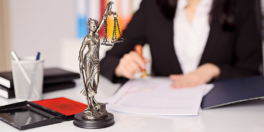 statuette-of-themis-the-goddess-of-justice-on-lawyers-desk